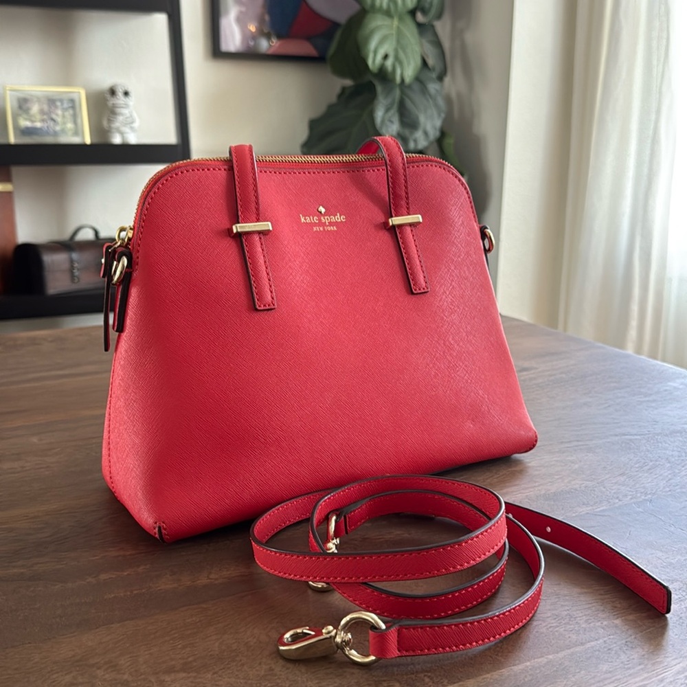 Handbag by Kate Spade, color- red, condition-excellent